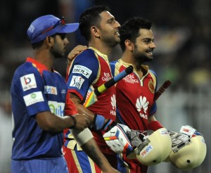 Virat Kohli and Yuvraj Singh walk off victorious © BCCI 
