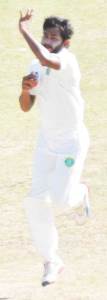 Devendra Bishoo bowls during his 4-67.