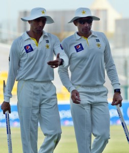 Younis Khan and Misbah-ul-Haq walk off after the victory © AFP 