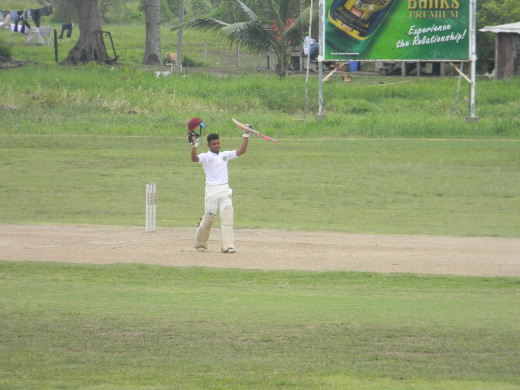 enaldo Renee acknowledges the crowd after scoring his century (165*) in Berbice vs Demerara match at Everest